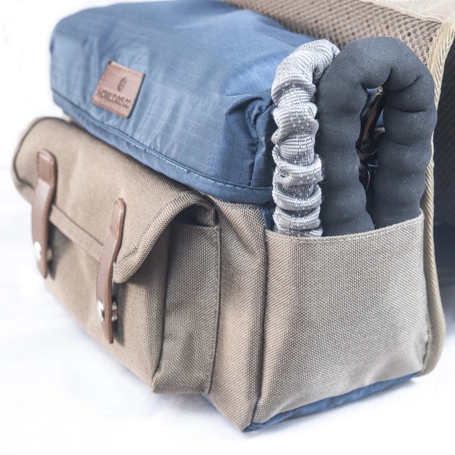 Dog backpack design featuring convenient side pocket for leash and accessories