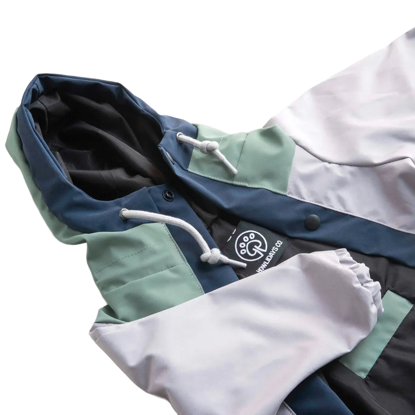 Close-up of dog raincoat hood, highlighting coverage, waterproof design, and comfort for outdoor activities.